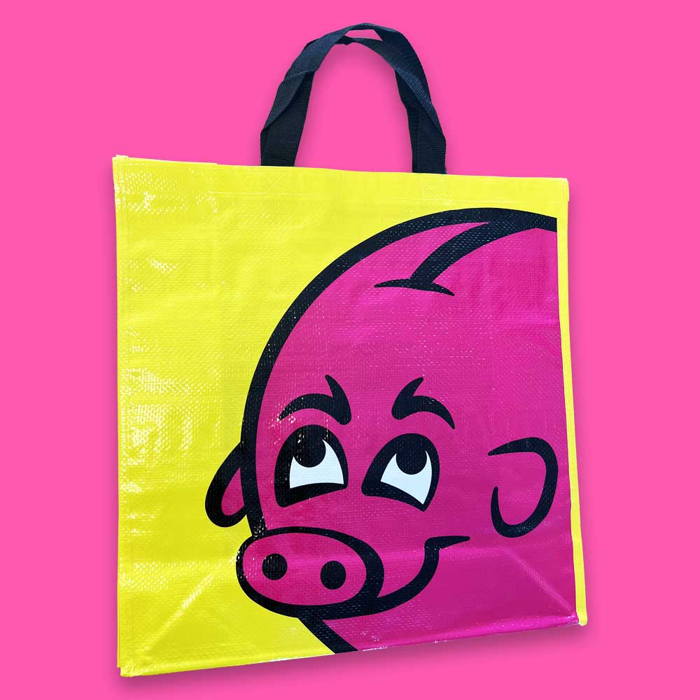 The famous yellow Bónus shopping bag featuring the pink pig logo, a must-have for Icelandic grocery shoppers